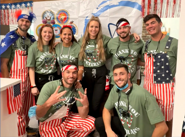 The friendly Watts Dental team dressed up to celebrate veterans in the office